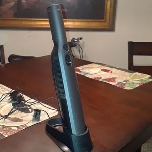 Hand held vacuum with charger